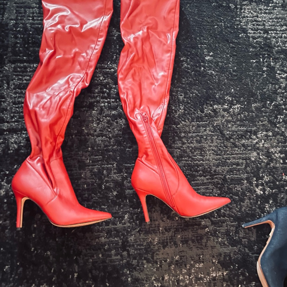 Red thigh high boots